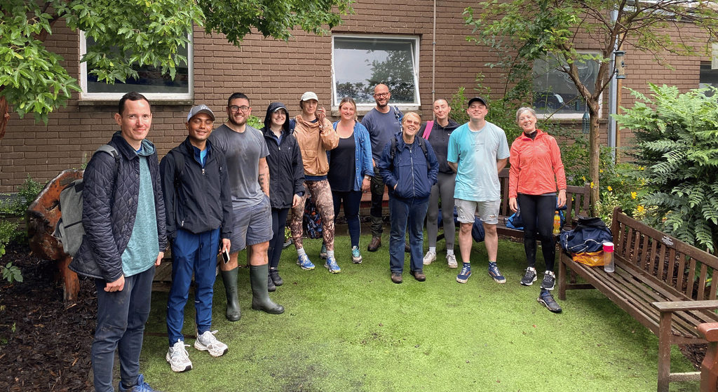 FreeAgent volunteers stood in the FACE garden