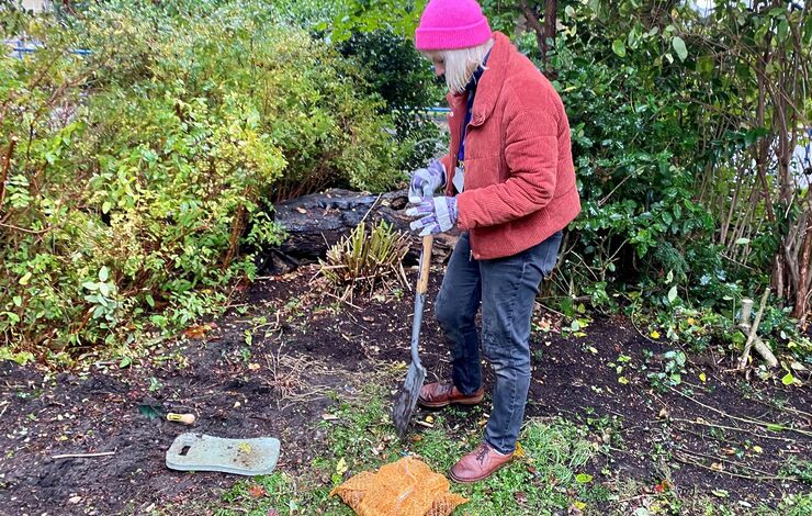 A member of staff planting in the grounds of the Western General