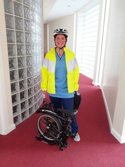 NHS Lothian staff member with her e-biked funded through Climate Challenge Grants