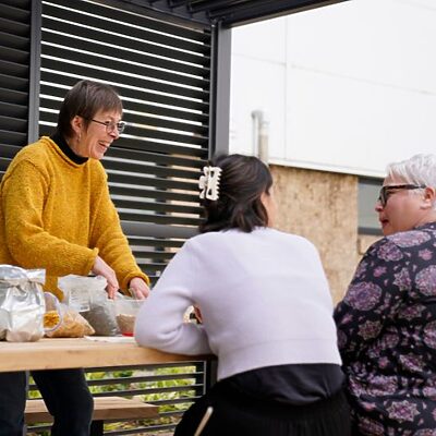 People engaging in the RIE staff courtyard