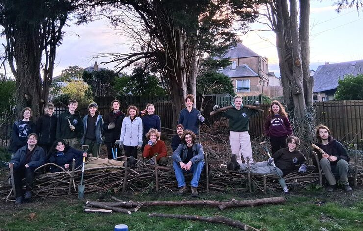 The University of Edinburgh's Dirty Weekenders conservation society smiling for the camera